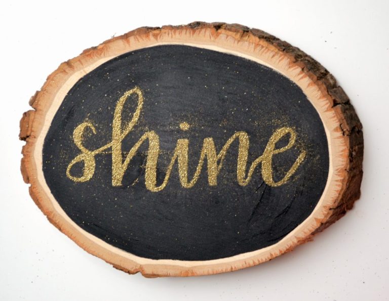 Embossed “Shine” Sign with Hand Lettering