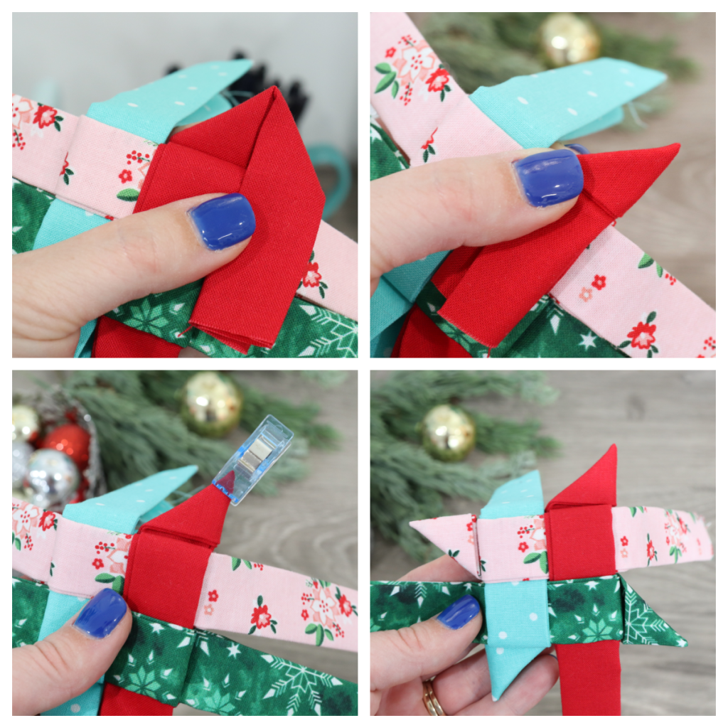 Image contains Amy's hand folding the strips of fabric into points of the star.