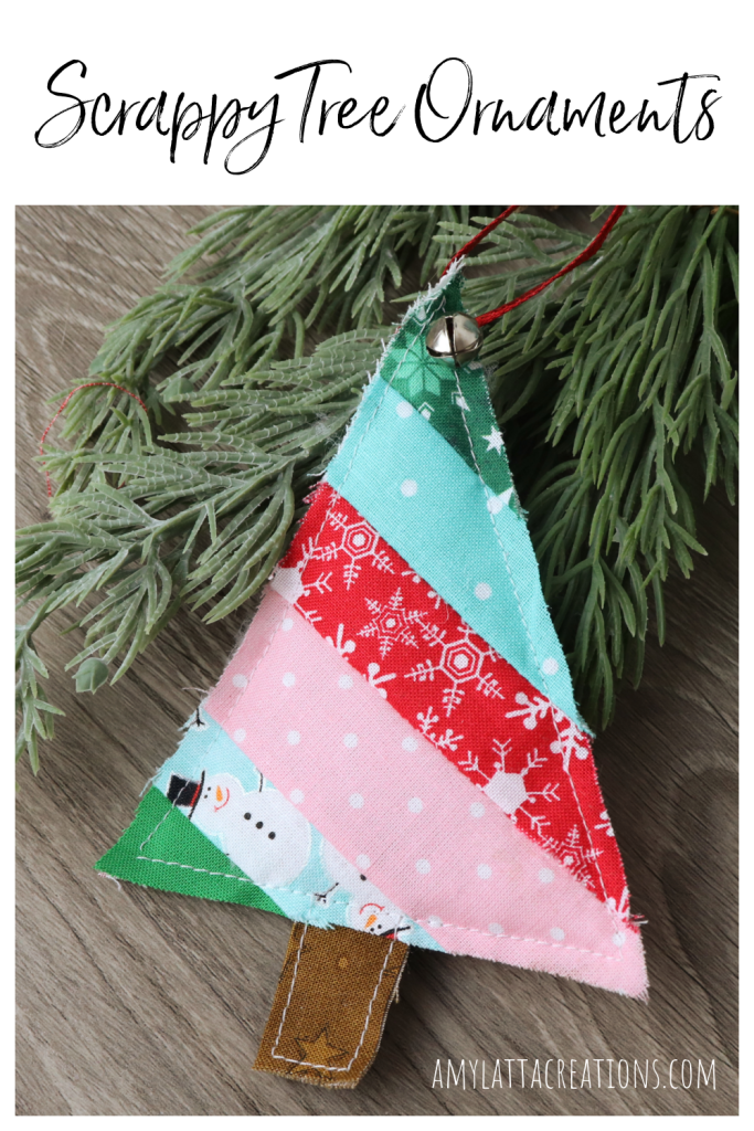 Image contains a tree shaped ornament made from diagonal stripes of fabric scraps.