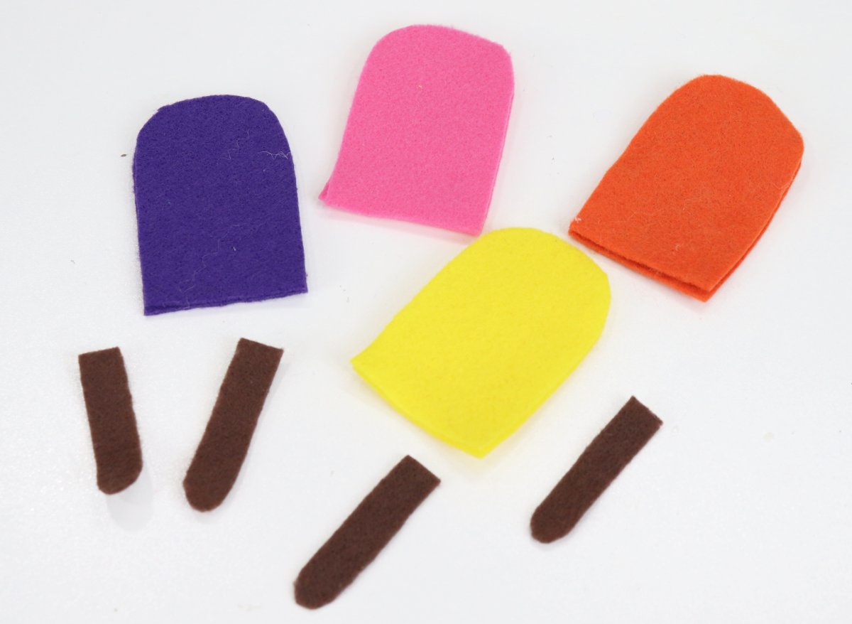 Image contains colored felt cut into popsicle and stick shapes.
