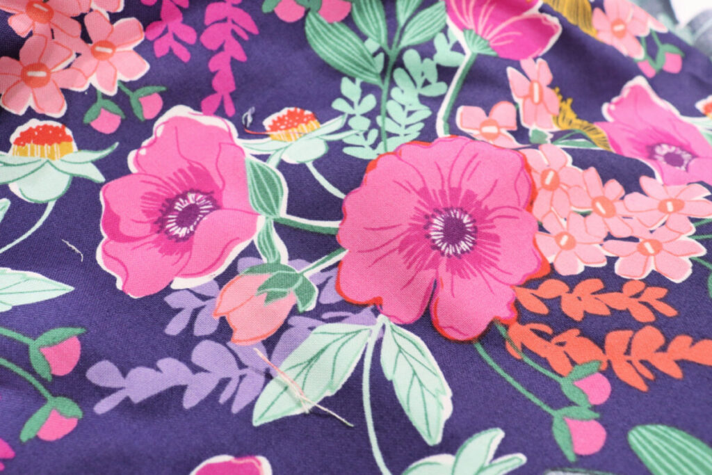 Image contains a closeup of the Felicity Fig yardage by Andover Fabrics. 