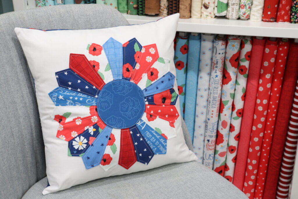 "Dresden Plate Pillow Cover” is a Free Quilted Pillow Pattern designed by Amy from Amy Lotta Creations!